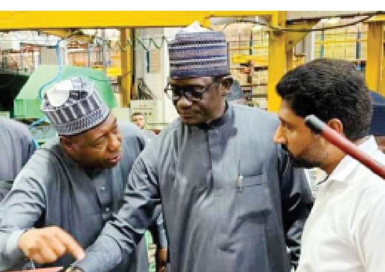 Governor Mai Mala Buni (2nd right) and Borno State Governor Babagana Zulum (2nd left) at a tractor factory in Pakistan