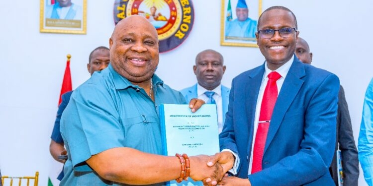 ICPC Partners Osun Government Against Corruption 1 ICPC chairman, Dr. Musa Adamu Aliu (right) presenting MOU agreement to Osun State Governor Ademola Adeleke at the banquet hall, Government House, Osogbo, yesterday. PHOTO: OSUN STATE PRESS UNIT