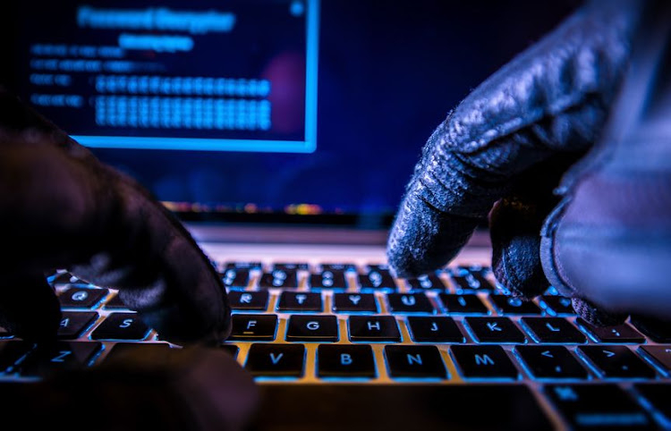 Shun Cultism, Cybercrime, Command Graduands Warned 1 Payments System Hacking. Online Credit Cards Payment Security Concept. Hacker in Black Gloves Hacking the System.
