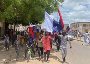 Protesters Brandish Russian Flags, Attack Bank In Kaduna