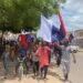 Protesters Brandish Russian Flags, Attack Bank In Kaduna 5 Protesters Brandish Russian Flags, Attack Bank In Kaduna