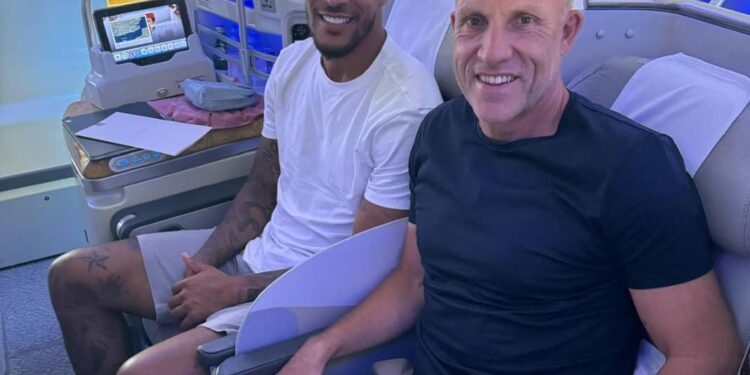Troost-Ekong and his agent David Moss, on their way to Saudi Arabia.