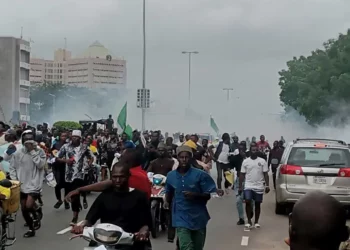 Hardship: Abuja Protesters Shout Down Minister As Police Fire Teargas At Eagle Square