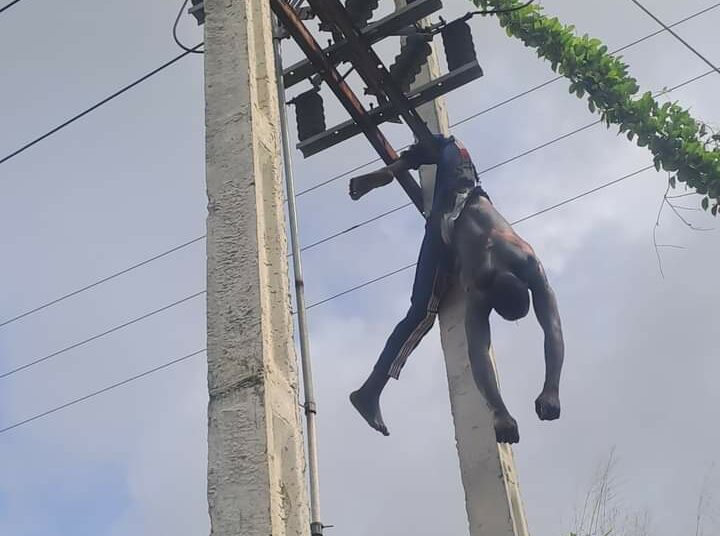 Cable Thieves Trapped To High Tension Pole In Akwa Ibom