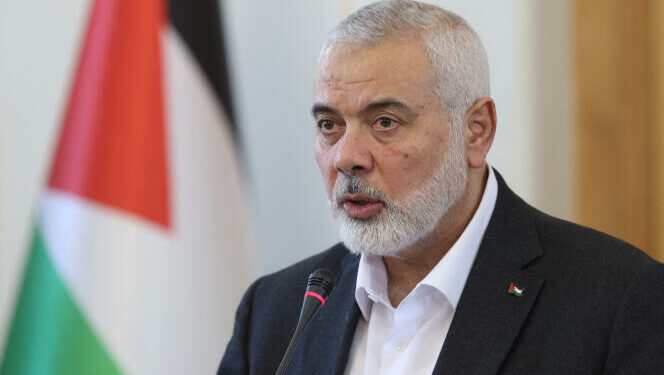 FILE PHOTO: Palestinian group Hamas' top leader, Ismail Haniyeh speaks during a press conference in Tehran, Iran, March 26, 2024. Majid Asgaripour/WANA (West Asia News Agency) via REUTERS ATTENTION EDITORS - THIS PICTURE WAS PROVIDED BY A THIRD PARTY./File Photo