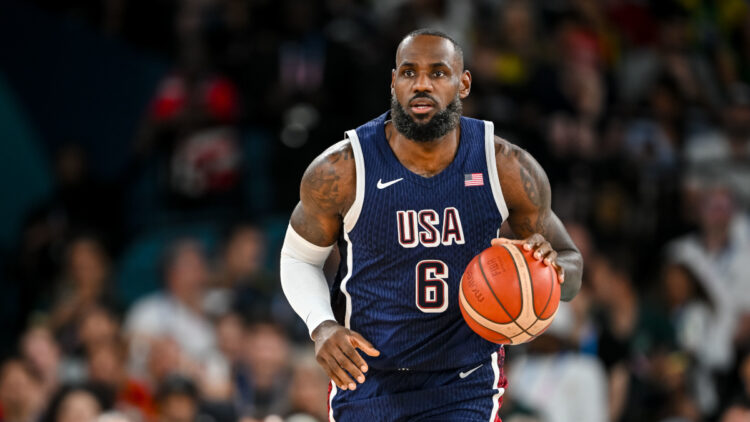 LeBron James of USA controls the Ball during the Men's Basketball Quarterfinal match between Brazil and United State on Day 11 of the Olympic Games Paris 2024 at Bercy Arena on August 6, 2024 in Paris, France. (Photo by Harry Langer/DeFodi Images via Getty Images)