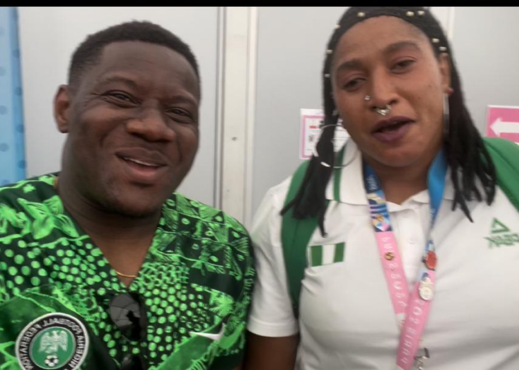 L-R: LEADERSHIP Correspondent, Wale Ayeni, and D'Tigress Assistant Coach, Aisha Mohammed, in Paris, France.