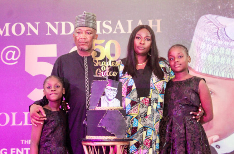 The celebrant and director, Press , LEADERSHIP Group Ltd, Solomon Nda-Isaiah (2nd left) with his wife, Agnes Nda-Isaiah (2nd right) and children, Eunice Nda-Isaiah (right),  Abigail Nda-Isaiah, during the colloquium to mark his 50th birthday celebration at  the Radio House, Abuja, yesterday