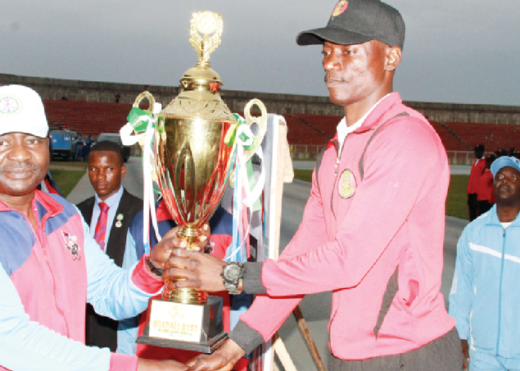 L-R: Chief of Defence Staff General Christopher Musa Presenting a Trophy to the Nigerian Army Captain, Lieutenant Emmanuel Pada at the Clossing Ceremony of 2024 Kaduna Armed Forces Games held at Ahmadu Bello stadium in Kaduna yesterday Photo Gbenga Folorunsho Abiola.