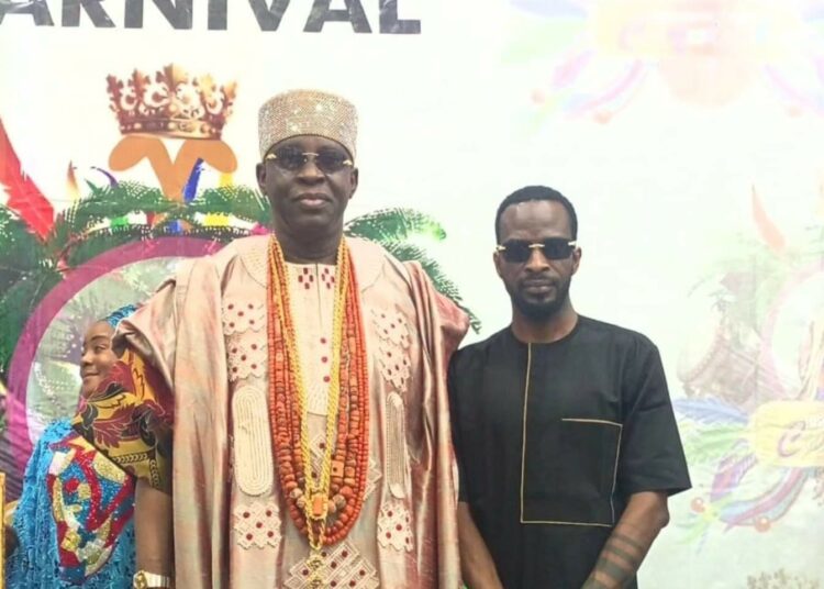 L-R: Soun of Ogbomosoland, Oba Ghandi Olaoye, and Ogbomoso Cradles Carnival Ambassador, 9ice.