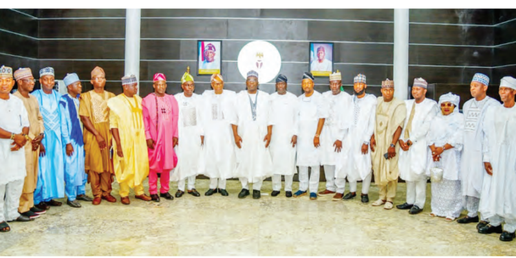 Kwara State Governor AbdulRahman AbdulRazaq (10th left) APC chairman, Prince Sunday Fagbemi( 9th left), speaker of the State House of Assembly, Engr. Yakubu Danladi-Salihu (11th left) with the new council chairmen after their inauguration at the Government House, Ilorin on Monday. PHOTO: ABDULLAHI OLESIN