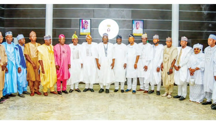 Kwara State Governor AbdulRahman AbdulRazaq (10th left) APC chairman, Prince Sunday Fagbemi( 9th left), speaker of the State House of Assembly, Engr. Yakubu Danladi-Salihu (11th left) with the new council chairmen after their inauguration at the Government House, Ilorin on Monday. PHOTO: ABDULLAHI OLESIN