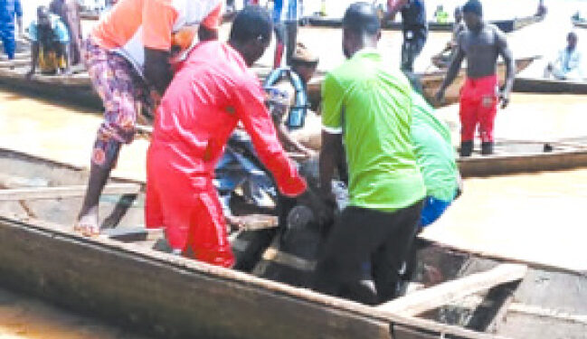 Rescue team and sympathisers searching for victims and bodies following the boat mishap that occurred in Gwajibo village in Niger State, yesterday.