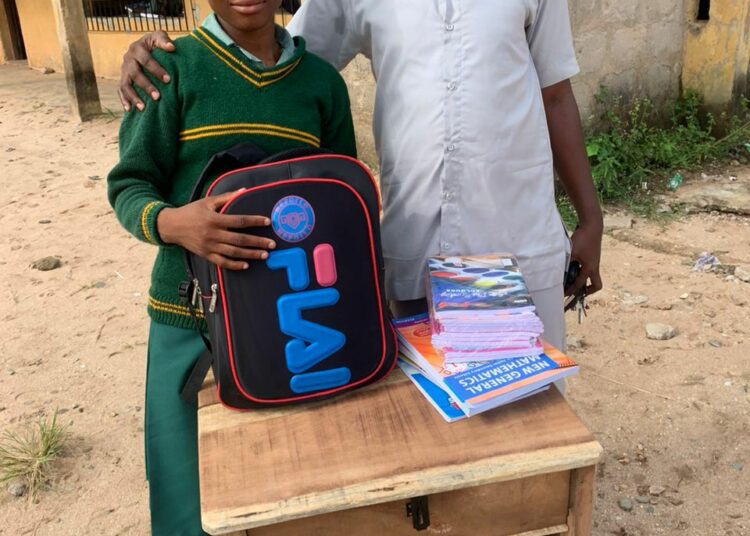 Chidiebube Okeoma and Chikamso Ekeocha when she resumed her new school in Owerri for her secondary school education.