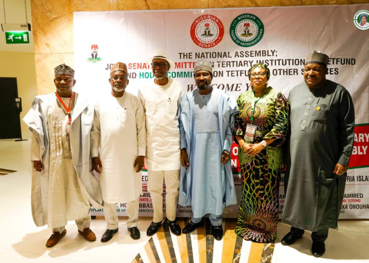 National Assembly Joint Committee on Tertiary Institutions and TETFund with the Deputy Senate President, Jibrin Barau (3rd from right), during the committee's retreat.