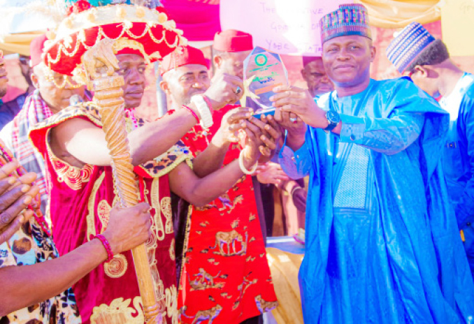 Igbo Community Honours Governor Buni Over Inclusivity, Compassion 1 Yobe State Information Commissioner, Hon Abdullahi Bego (right) receiving an award on behalf of Governor Mai Mala Buni by the Eze Igbo III na Potiskum, HRH. Sunday P. Ezenwenyi in Damaturu