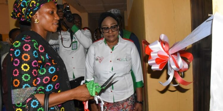 Representative of Kwara State First Lady and wife of the chairman of Baruten local government, Hajia Sahadat  Jibril (left); and the Executive Secretary, Kwara State Health Insurance Agency, Dr Olubunmi Jetawo-Winter during the official opening of Baruten regional office of the agency, in Okuta, Baruten LGA. Photo by Abdullahi Olesin.