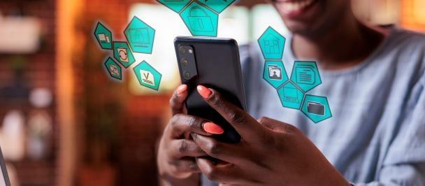 Experts Call For Sustainable Digital Platforms To Drive Transformation 1 woman navigating on phone with artificial intelligence pictograms original 2323823
