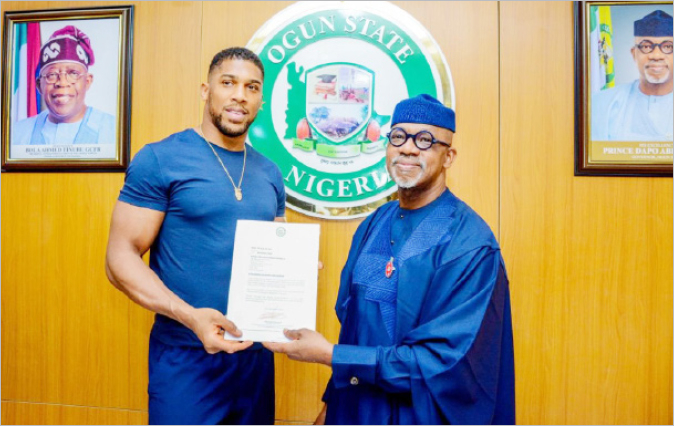 Ogun To Construct Anthony Joshua Indoor Boxing Ring – Abiodun 1 L-R: Former World Heavyweight Boxing Champion, Anthony Joshua, with Ogun State Governor Dapo Abiodun, when he visited the governor in his office at Oke-Mosan Abeokuta, where the governor presented Joshua the letter of appointment as sport ambassador