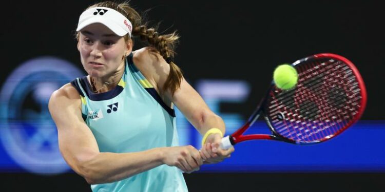 MIAMI GARDENS, FLORIDA - MARCH 26: Elena Rybakina of Kazakhstan returns a shot to Maria Sakkari of Greece during her women's singles match during the Miami Open at Hard Rock Stadium on March 26, 2024 in Miami Gardens, Florida. (Photo by Megan Briggs/Getty Images)