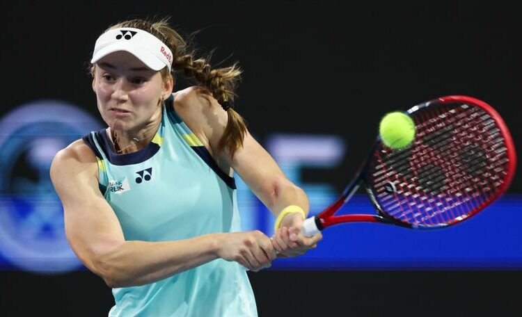 MIAMI GARDENS, FLORIDA - MARCH 26: Elena Rybakina of Kazakhstan returns a shot to Maria Sakkari of Greece during her women's singles match during the Miami Open at Hard Rock Stadium on March 26, 2024 in Miami Gardens, Florida. (Photo by Megan Briggs/Getty Images)