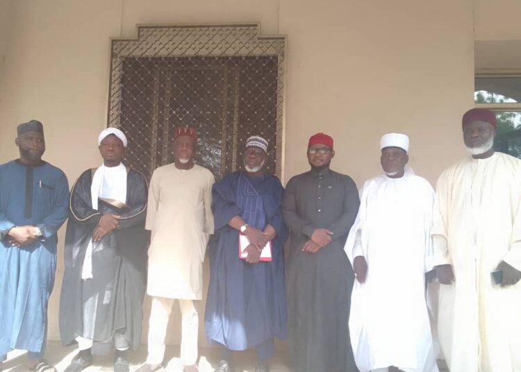 L-R: Prof Luqman Zakariyah (Resident Imam); Sheikh Abdulkadir Salman (visiting Imam); secretary-general of NSCIA, Prof. Is-haq Oloyede; deputy secretary-general of NSCIA, Prof. Salisu Shehu; Barr. Haroun Muhammed Eze (resident Imam); Prof Khalid Aliyu Abubakar (Visiting Imam), and Prof. Ilyasu Tochukwu Usman (visiting Imam) after the unveiling of the five new Imams for the National Mosque in Abuja, on Tuesday.