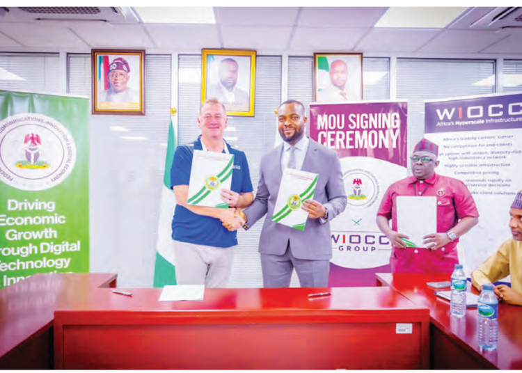 Minister of Communications, Innovation and Digital Economy, Dr Bosun Tijani, in handshake with WIOCC Group’s Chief Development Officer, Mr. Darren Bedford, after signing a Memorandum of Understanding (MoU) in Abuja