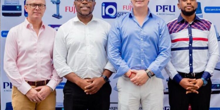 L-R: Technical Sales Specialist, Europe, Middle East & Africa, Mr Gavin Hubbard; MD, IQ Distributions Limited, Authorised Distributor, Ricoh Products in Nigeria & West Africa⁠, Mr Richard Amaechi Ani; the Regional Sales Director, Ricoh PFU, Middle East & Africa, Mr Adrian Cafferkey and CTO, IQ Distributions Limited, ⁠Mr Jeff Udoh, at the Ricoh new products launch event, in Lagos state recently.