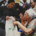 Yuletide: Mercy Chinwo, Husband Distribute Food To Single Mothers, Others