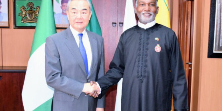 L-R: Chinese Foreign Minister  Wang Yi and his Nigerian counterpart, Yusuf Maitama Tuggar, during a meeting in Abuja on Thursday.