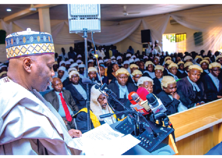 Governor Inuwa Yahaya addressing  judicial officers and legal practitioners during the 2025 legal year celebration in Gombe