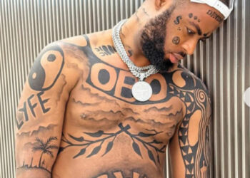 Trinity Guy Tattoos Davido’s Name On His Body