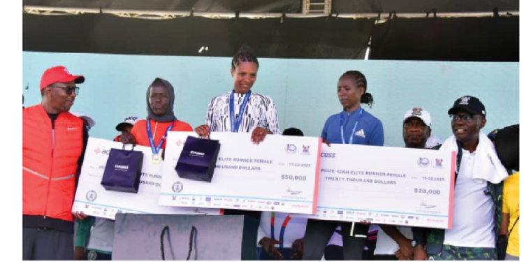 L-R: Shehu Dikko, chairman, National Sports Commission; Chizoma Okoli, deputy managing director, Access Bank Plc; Sang Benard Cheruiyot, 3rd position, 42km male category; Koech Edwin Kibet, winner; Kipygon Hehemiah, 2nd position, all from Kenya; Babajide Sanwo-Olu, governor, Lagos State, and his deputy Obafemi Hamzat, at the Access Bank Lagos City Marathon’s 10th edition, in Lagos, yesterday.PHOTO BY KOLAWOLE ALIU