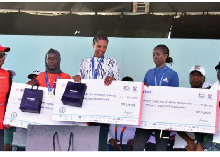 L-R: Shehu Dikko, chairman, National Sports Commission; Chizoma Okoli, deputy managing director, Access Bank Plc; Sang Benard Cheruiyot, 3rd position, 42km male category; Koech Edwin Kibet, winner; Kipygon Hehemiah, 2nd position, all from Kenya; Babajide Sanwo-Olu, governor, Lagos State, and his deputy Obafemi Hamzat, at the Access Bank Lagos City Marathon’s 10th edition, in Lagos, yesterday.PHOTO BY KOLAWOLE ALIU