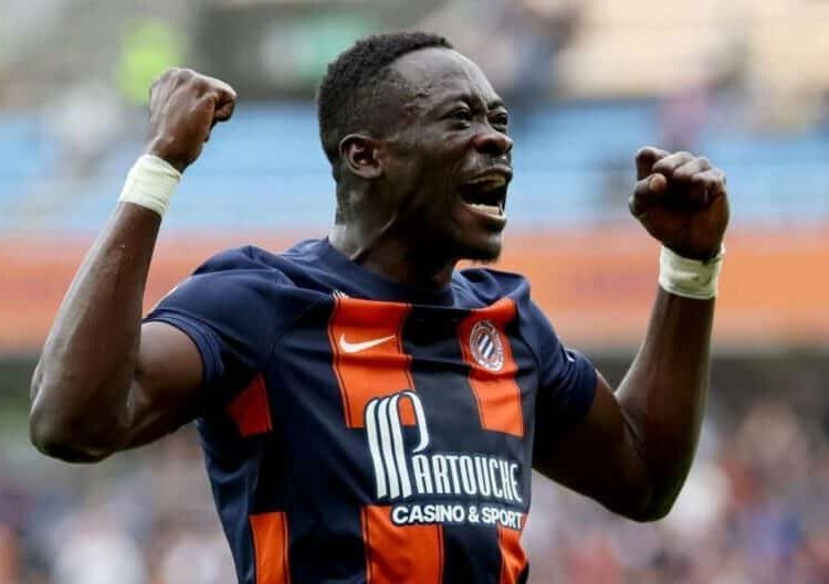 Montpellier's Nigerian forward #08 Akor Adams celebrates scoring his team's first goal during the French L1 football match between Montpellier Herault SC and Toulouse FC at Stade de la Mosson in Montpellier, southern France on October 29, 2023. (Photo by Pascal GUYOT / AFP) (Photo by PASCAL GUYOT/AFP via Getty Images)