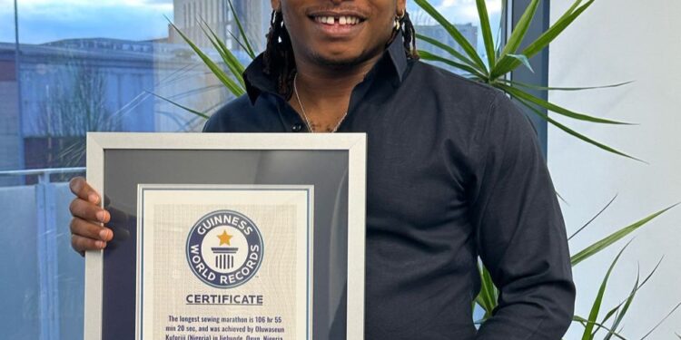 Nigerian Designer Kuforiji Oluwaseun Breaks Guinness World Record For Sewing Marathon