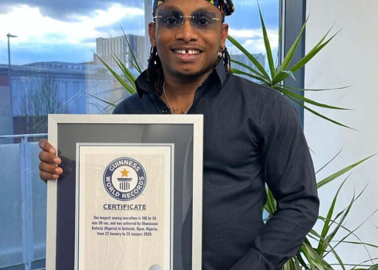 Nigerian Designer Kuforiji Oluwaseun Breaks Guinness World Record For Sewing Marathon