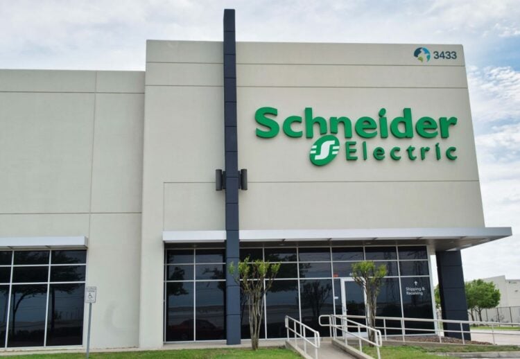 Houston, Texas USA 03-29-2020: Schneider Electric office building exterior in Houston, TX. Developer of electrical equipment, industrial machine automation and sustainability.