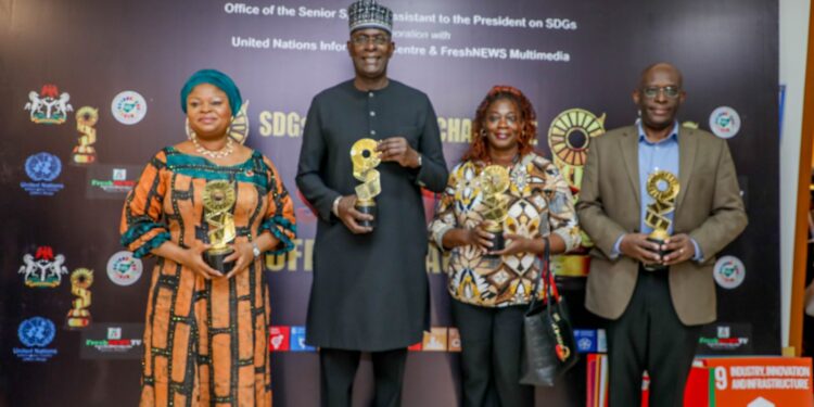 L-R: SSA to the President on SDGs, Princess Adejoke Orelope-Adefurile; UN Resident Coordinator, Mr Mohamed Malick Fall, and UNFPA Deputy Representative, Francis Kuawu Koessan, at the unveiling of the SDGs Short Film Challenge and Awards, in Abuja, on Wednesday.