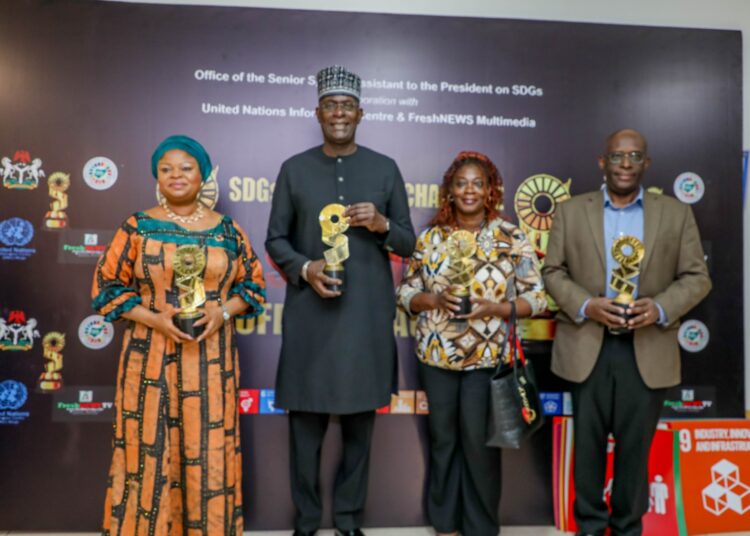 L-R: SSA to the President on SDGs, Princess Adejoke Orelope-Adefurile; UN Resident Coordinator, Mr Mohamed Malick Fall, and UNFPA Deputy Representative, Francis Kuawu Koessan, at the unveiling of the SDGs Short Film Challenge and Awards, in Abuja, on Wednesday.