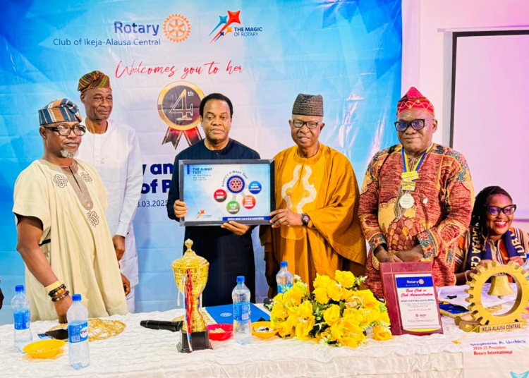 Rotarian Donald Duke (middle) with the 4-Way Test gift presented to him by District Governor Nominee Designate (D9111), Rotarian Samuel Ayetutu (first left). With them are: Assistant Governor Ibraheem Adebayo; Past District Governor (D9110), Rotarian Bola Onabadejo; President of Rotary Club of Ikeja-Alausa Central, Rotarian Muyiwa Akintunde; and Past President of the club, Rotarian (Dr.) Adebukunola Soile-Balogun (seated)