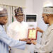 SONA: Yobe Higher Education Commissioner Presents ‘Hall Of Fame’  Award To Gov Buni