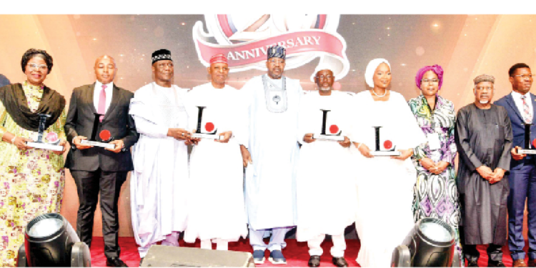 L-R: Company of the year awardee, MD/CEO, AVSATEL communications, Gorge Eder;  governor of the year awardee's representative/ Akwa Ibom State deputy governor, Senator Akon Eyakenyi; governor of the year awardee's representative/ Enugu State deputy governor, Ifeanyi Ossai; governor of the year awardee's representative/Speaker, Bauchi State House of Assembly, Abubakar Y. Suleiman; governor of the year awardee, Kano State Governor Abba Kabir Yusuf; representative of the vice president, Aliyu Modibo Umar; governor of the year awardee, Jigawa State Governor Umar A. Namadi; social impact person of the year awardee, Queen of Warri Kingdom, Her Majesty, Olori Atuwatse III; chairman, LEADERSHIP Group Ltd, Mrs Zainab Nda-Isaiah;  person of the year awardee's representative/ special adviser to the president, Dangote Group, Engr Mansur Ahmed; outstanding  young person of the year award recipient/ team lead, ENACTUS Champions, Levi Israel and oil and gas local content champion of the year award recipient, GMD and CEO of ARCO Group, Alfred Okoigun during the 17th edition of LEADERSHIP annual conference and awards in Abuja, yesterday.