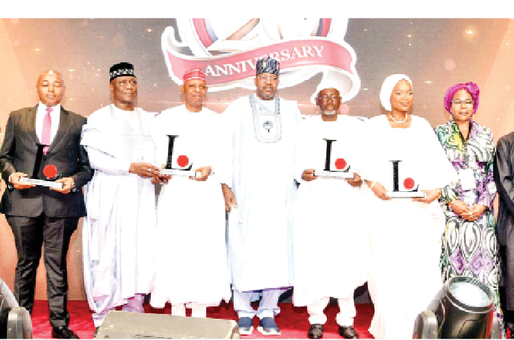 L-R: Company of the year awardee, MD/CEO, AVSATEL communications, Gorge Eder;  governor of the year awardee's representative/ Akwa Ibom State deputy governor, Senator Akon Eyakenyi; governor of the year awardee's representative/ Enugu State deputy governor, Ifeanyi Ossai; governor of the year awardee's representative/Speaker, Bauchi State House of Assembly, Abubakar Y. Suleiman; governor of the year awardee, Kano State Governor Abba Kabir Yusuf; representative of the vice president, Aliyu Modibo Umar; governor of the year awardee, Jigawa State Governor Umar A. Namadi; social impact person of the year awardee, Queen of Warri Kingdom, Her Majesty, Olori Atuwatse III; chairman, LEADERSHIP Group Ltd, Mrs Zainab Nda-Isaiah;  person of the year awardee's representative/ special adviser to the president, Dangote Group, Engr Mansur Ahmed; outstanding  young person of the year award recipient/ team lead, ENACTUS Champions, Levi Israel and oil and gas local content champion of the year award recipient, GMD and CEO of ARCO Group, Alfred Okoigun during the 17th edition of LEADERSHIP annual conference and awards in Abuja, yesterday.
