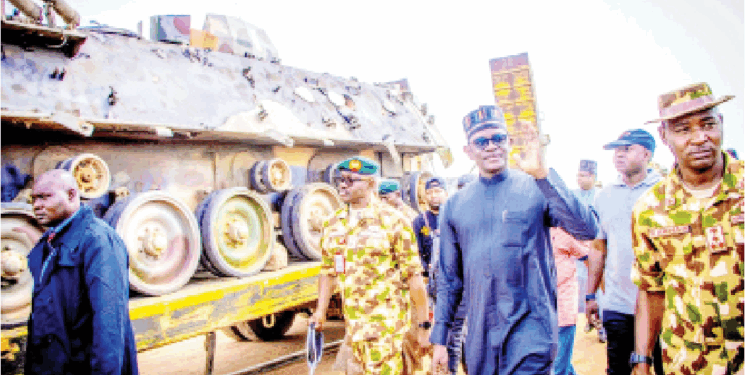 Gov Mai Mala Buni (2nd right) when he visited 27 Task Force Brigade Buni Gari, to sympathise with them over the recent attack by insurgents