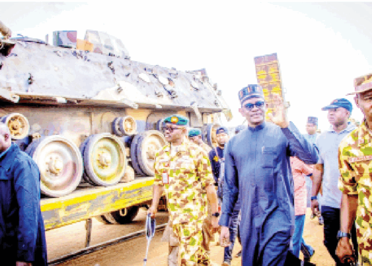 Gov Mai Mala Buni (2nd right) when he visited 27 Task Force Brigade Buni Gari, to sympathise with them over the recent attack by insurgents