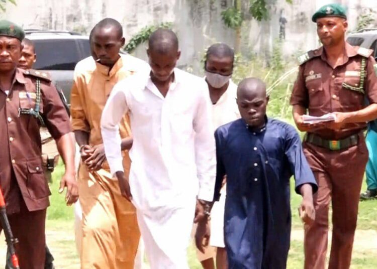 Suspected murderers of Hafsoh Lawal being led to the courtroom in Ilorin, Kwara State, on Monday. Photo: Abdullahi Olesin.