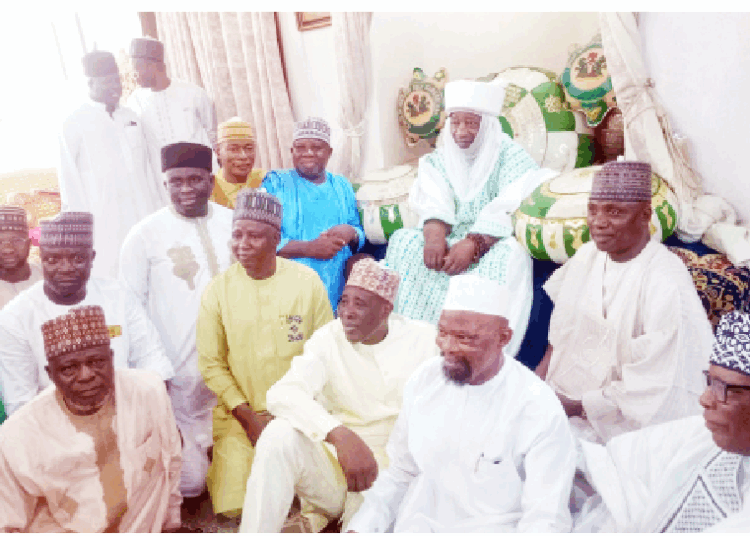 Dignitaries at the prayer session at the palace of the Emir of Ilorin.  PHOTOS BY ABDULLAHI OLESIN