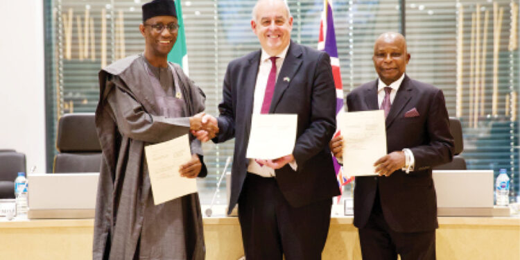 R-L: National Security Adviser (NSA), Nuhu Ribadu;  UK’s Minister for Fraud, Lord Hanson and Nigeria’s Attorney-General and Minister of Justice, Lateef Fagbemi, after signing the agreement in Abuja, recently.