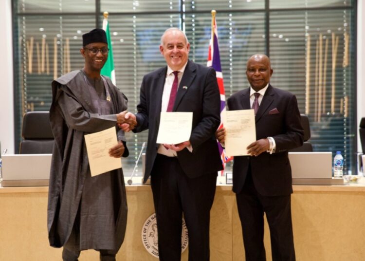 R-L: National Security Adviser, Nuhu Ribadu; UK’s Minister for Fraud, Lord Hanson and Nigeria’s Attorney General and Minister of Justice, Prince Lateef Fagbemi, SAN, after signing the agreement in Abuja, recently.